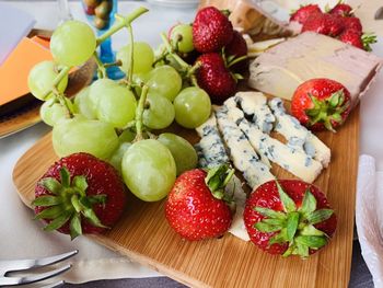 High angle view of strawberries in plate on table