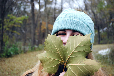 Portrait of young woman in forest