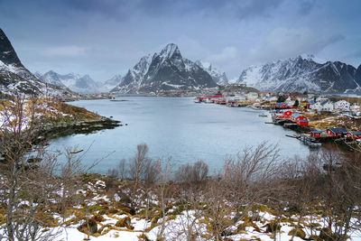 Scenic view of frozen lake against sky during winter