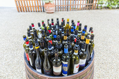 High angle view of bottles on shelf