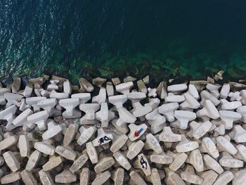 High angle view of people on stones 