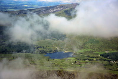 Smoke emitting from volcanic mountain
