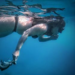 Man swimming in sea