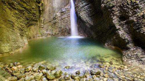 Scenic view of waterfall in forest