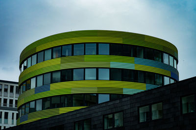 Low angle view of modern building against sky
