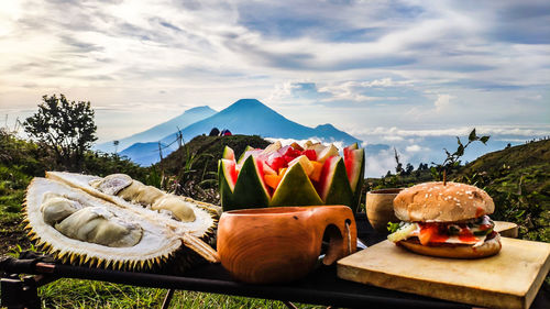 Close-up of food on table against sky