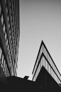 Low angle view of modern buildings against clear sky