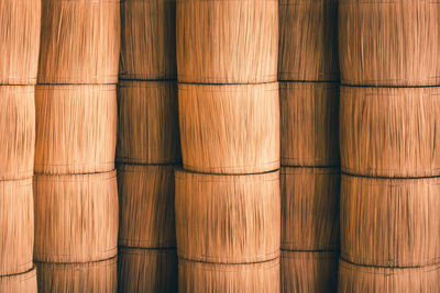 Full frame shot of stacked bamboo containers