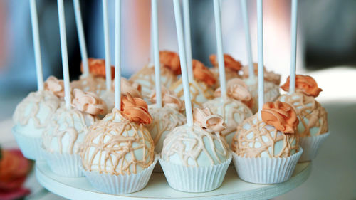 Close-up, a variety of delicious desserts, cupcakes, cream cakes, whipped cream, 