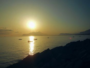 Scenic view of sea at sunset