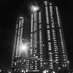 Low angle view of illuminated building at night