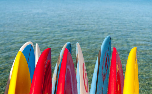 Close-up of multi colored water on beach