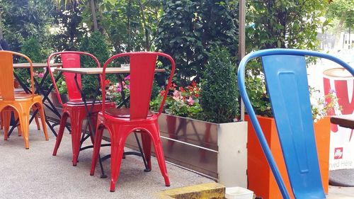 Chairs and table at sidewalk cafe