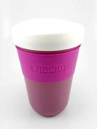 Close-up of coffee cup against white background