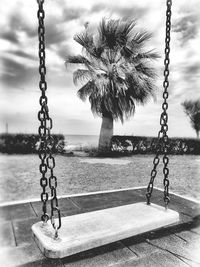 View of swing ride against sky