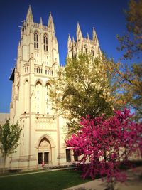 Low angle view of church against blue sky