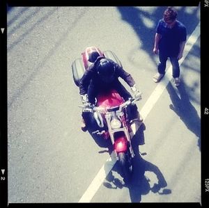 Full length of woman standing on bench