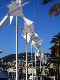 Built structure and trees against blue sky