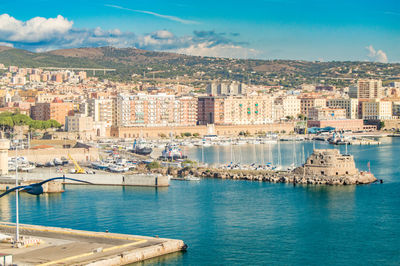 View of civitavecchia, rome's cruise and ferry port. city in the background, sunny day, view from 