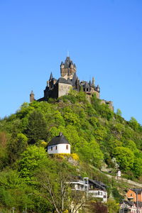 Historic building against clear blue sky