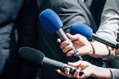 Meida microphones. news reporters holding microphones, taking an official statement