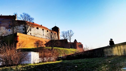 Low angle view of wawel castle against clear sky