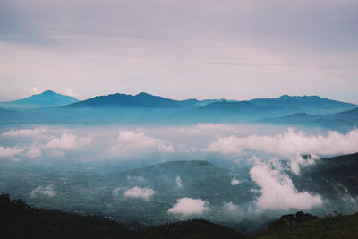 Scenic view of mountains against sky during sunset