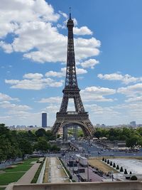 View of tower against cloudy sky