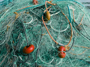 Full frame shot of turquoise fishing net