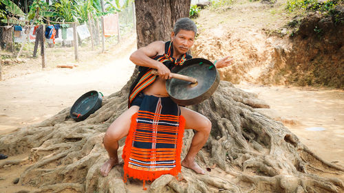 Side view of man working at construction site