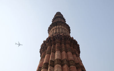 Low angle view of statue of temple against clear sky