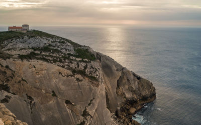 Scenic view of sea against sky at sunset