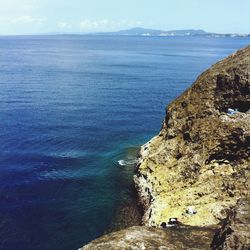 Scenic view of sea against blue sky