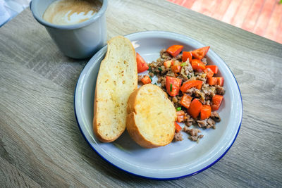 High angle view of breakfast served on table