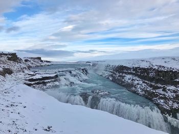 Close-up of reflection of clouds in water