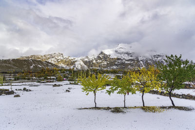 Scenic view of snowcapped mountains against sky