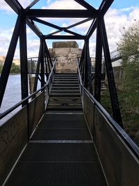 Elevated walkway against sky