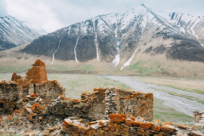 Scenic view of snowcapped mountains against sky