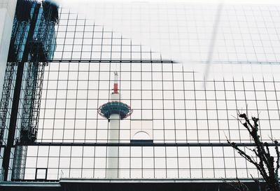 Low angle view of skyscraper against sky