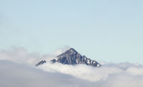 Scenic view of snowcapped mountain against sky