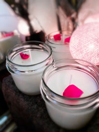 Close-up of scented candles on table