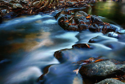 Stream flowing through rocks