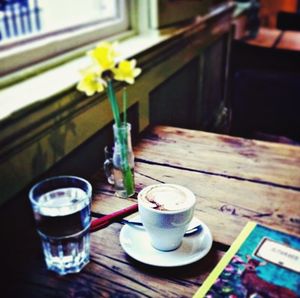 Close-up of coffee cup on table