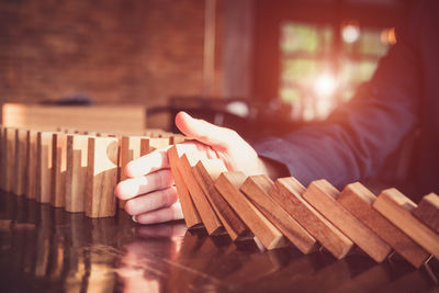 Close-up of man playing piano