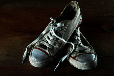 Close-up of shoes on table