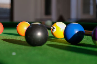 Close-up of multi colored balls on table