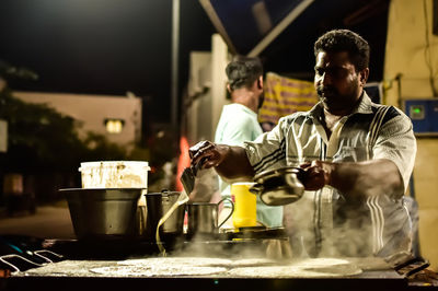 Young man having food