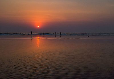 Scenic view of beach during sunset