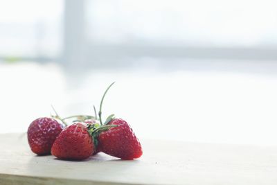 Close-up of strawberries on table