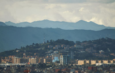 Cityscape against mountains